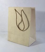 handmade paper texture and jute handle bag