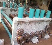 COIL LEVELER MACHINE