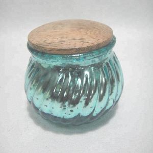 Antique glass paraffin wax candle jar