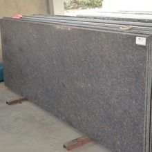 Ten brown lapato granite slabs