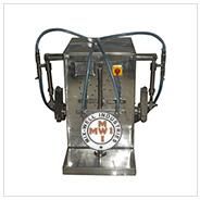 VOLUMATIC BOTTLE FILLING MACHINE