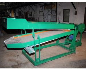 STALK EXTRACTOR AND GRADING MACHINE