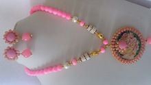 pink pendant and earings jewelry