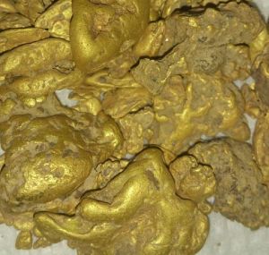 Raw gold bars