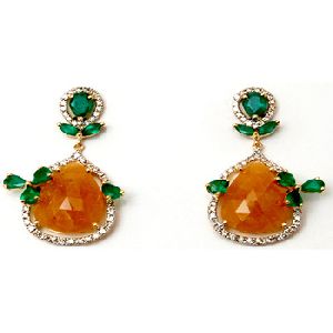 fabulous channel set diamond studded pear shaped yellow sapphire,emerald earrings