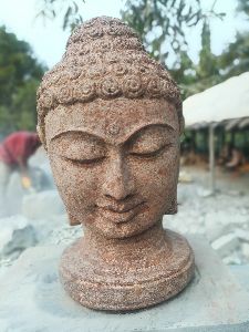 Buddha head statue in sand stone