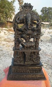 Three head Ganesha statue in black stone