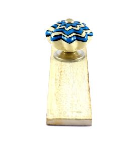 AQUA FLOWER KNOB ON WHITE DOOR STOPPER