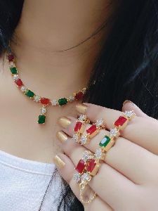 Ankur brillant gold plated green and red american diamond combo necklace set for women