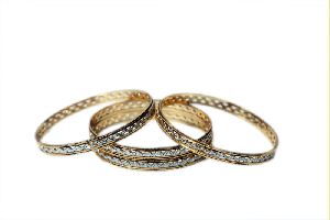 Gold Four Piece Bangles Set