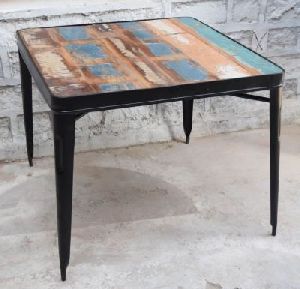 Iron table with reclaimed top