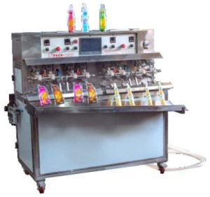 Fruit Juice Filling and Sealing Machine