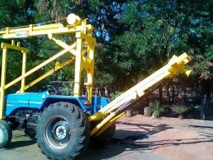 Truck mounted hydraulic pole hole drilling rig