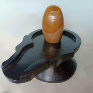 Orange Narmada Stone Shiva Lingam