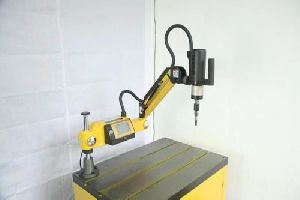 flexible arm tapping machine