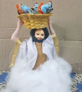 Vasudev Carrying Krishna Doll