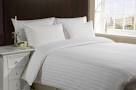 white hotel bed sheet
