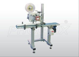 Top labeling machine