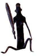 Wrought Iron Tribal Lady Grain Grinding Figurine