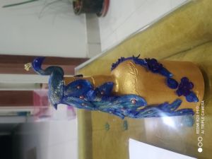 Peacock on bottles