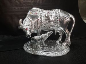 White metal kamadhenu