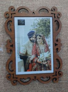 Wooden photo frame with laser cutting brown