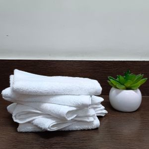 white cotton face towels