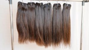 NATURAL WAVY BROWN INDIAN HUMAN HAIR EXTENSIONS