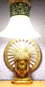 brass face buddha