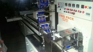 AUTOMATIC SOAP PACKAGING MACHINE