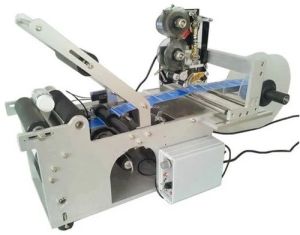 SEMI - AUTOMATIC LABELLING MACHINE