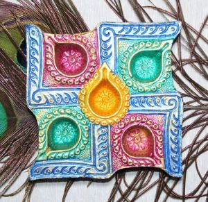 Multicolored Swastik Clay Diya