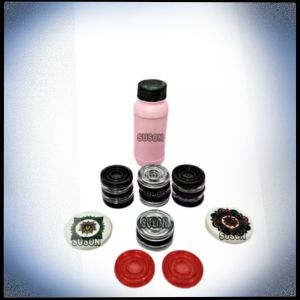 Carrom coins with 2 sticker and 1 powder bottle