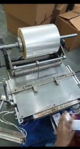 manual over wrapping machine