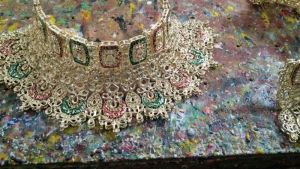 bridal meena work kundan set