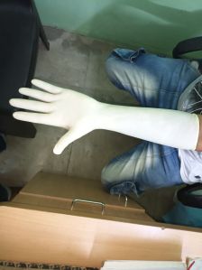 Elbow length latex surgical gloves