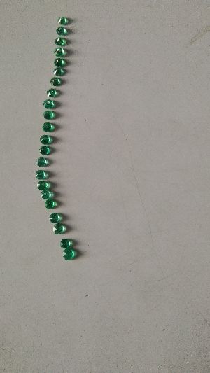 Round diamond cut emerald