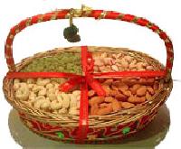 Mix dry fruits in cane basket arrangement