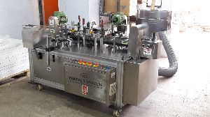 USE AND THROW BALL PEN FILLING MACHINE