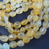 Yellow Chalcedony Plane Smooth Nuggets Tumble