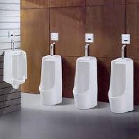 automatic urinal flushers