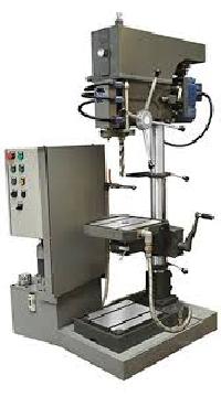 AUTOMATIC DRILLING MACHINE