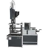 VERTICLE SCREW INJECTION MOULDING MACHINE