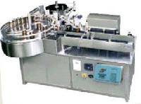 Vertical Labeling Machine with inbuilt Turn Table.