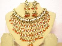 CNK - 264 Gold Plated red beaded Kundan Necklace Set