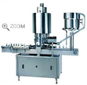 FOUR HEAD CAPPING MACHINE