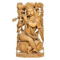 wooden lord krishna statue