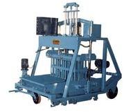 Concrete brick making machine