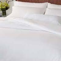 white bed sheets