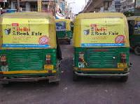 Auto Rickshaw Branding with vinyl pasting